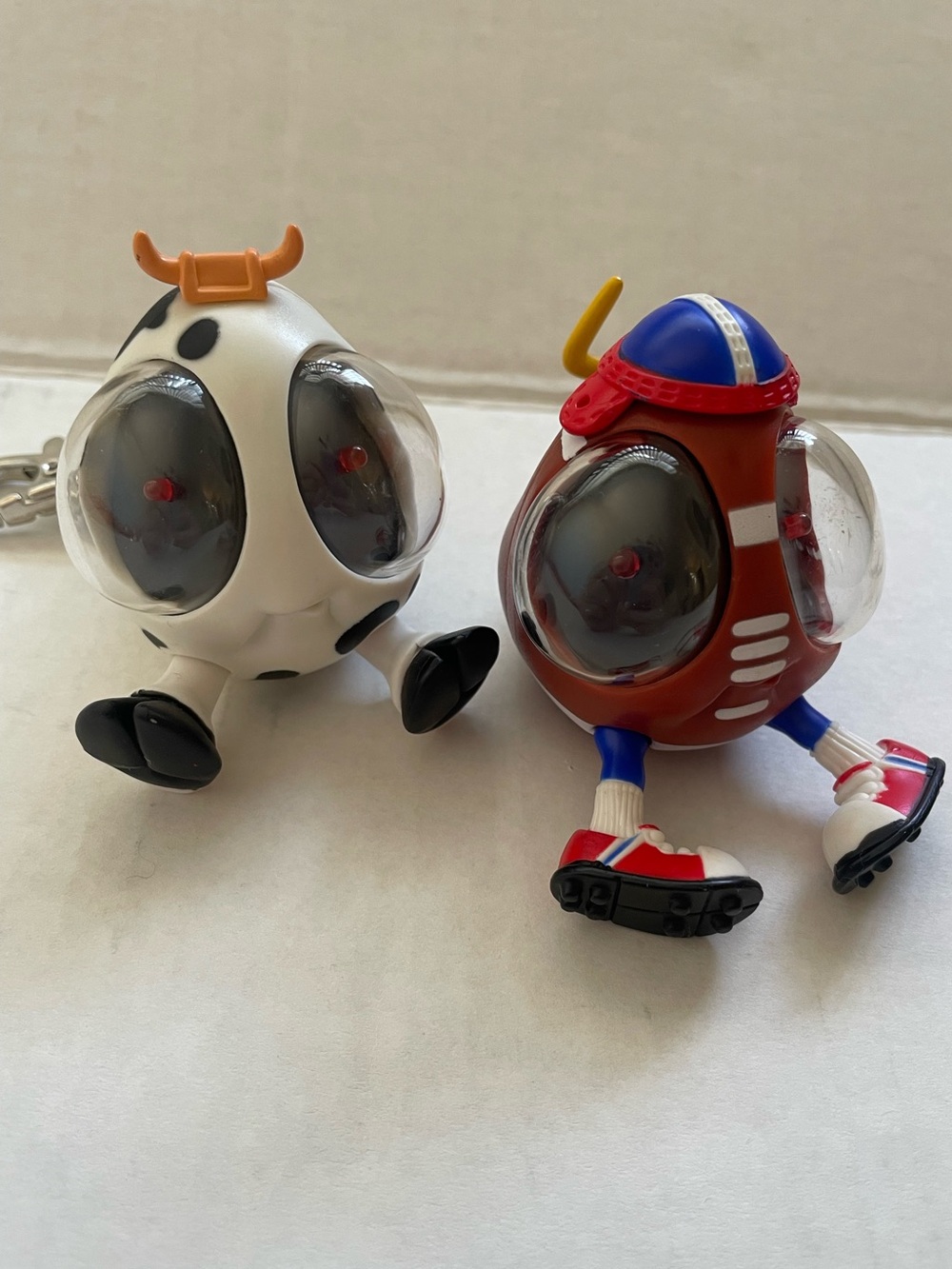 Vintage 2000 Ooglies keychain cow football